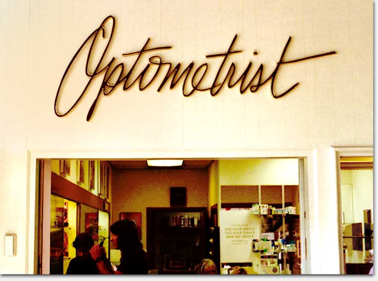 'Optometrist' original hand-lettering by artist Eric Wrobbel for The Broadway department store, Woodland Hills, California, 1985. More hand-lettering and type design here: https://www.ericwrobbel.com/art/lettering.htm