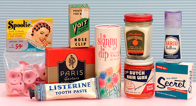 Bathroom collectibles: Spoolie, Listerine toothpaste, Secret Deodorant, Arrid Deodorant, Lucky Tiger Butch Hair Wax, Skinny Dip, Voit nose clip, Paris garters, Modern hair pomade. From 'More Bathroom Collectibles' at the web's largest private collection of antiques & collectibles: https://www.ericwrobbel.com/collections/bathroom-2.htm