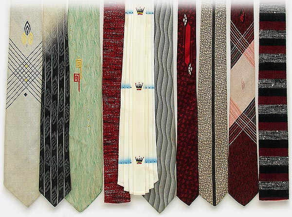 Vintage neckties: The red square-end is a Van-Cali ('a Van Heusen original'). The wonderful white pleated tie is from Wormser 'Hatters To Men.' The skinny red & black pattern is from Lefohn's Store for Men, Hollywood and the gray silk with the line down the center is a Don Loper of California. Far right is a wool tie marked 'The Cabrillo.' c.1959. From 'Vintage Clothes' at the web's largest private collection of antiques & collectibles: https://www.ericwrobbel.com/collections/clothes.htm