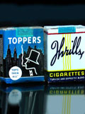 Old cigarette packs had some terrific designs. Here are 'Toppers' from United Whelan and 'Thrills' from Axton-Fisher Tobacco. Much more at 'Cigarette Packs' at the web's largest private collection of antiques & collectibles: https://www.ericwrobbel.com/collections