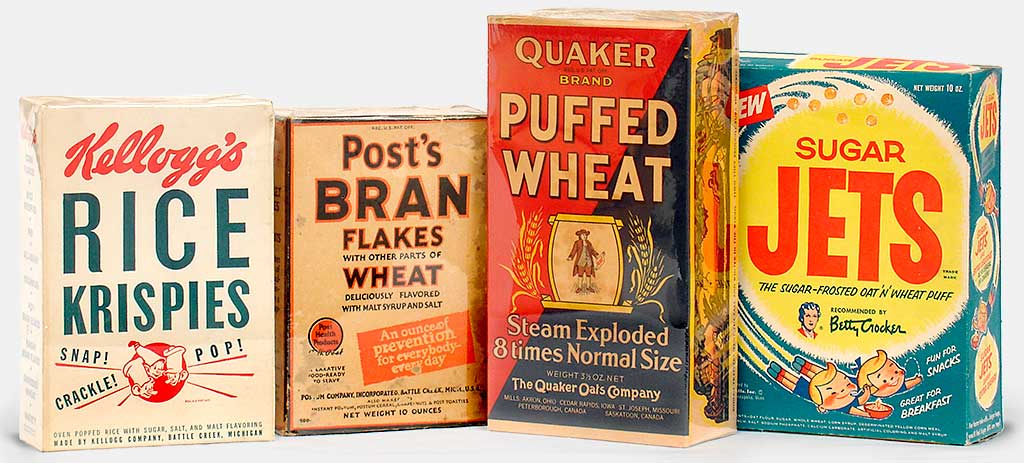 Vintage Kitchen Collectibles: Kellogg's Rice Krispies c.1950, Post's Bran Flakes (Postum Company, Battle Creek, Michigan) c.1930, Quaker Puffed Wheat (The Quaker Oats Company) 'Steam Exploded 8 Times Normal Size!' c.1940s, Sugar Jets (General Mills) late 1950s. Jets was my favorite as a kid and I miss them and I want them back now! From 'Kitchen Collectibles' at the web's largest private collection of antiques & collectibles: https://www.ericwrobbel.com/collections/kitchen-collectibles.htm