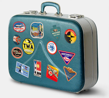 Vintage Aero-Pak suitcase with airline luggage labels. From 'Luggage Labels & Airlines' at the web's largest private collection of antiques & collectibles: https://www.ericwrobbel.com/collections/labels.htm