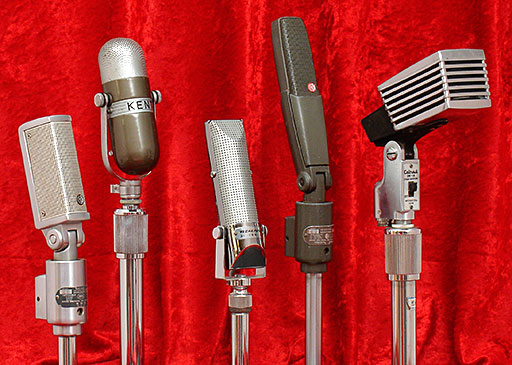 Vintage Collectible Microphones: Shure 'Uniron' 330, a variant of the Shure SM33 model Johnny Carson used on The Tonight Show for many years (USA). Kent DM-17 (Japan), a mini knockoff of the famed RCA 77. Next is a Realistic 33-999 from Radio Shack (Japan), Shure 300 (USA), and the stylish and interesting Calrad DM-18 (Japan). From 'Microphones' at the web's largest private collection of antiques & collectibles: https://www.ericwrobbel.com/collections/microphones.htm